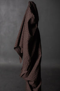 a dark rich purple eyelet embroidered cotton fabric