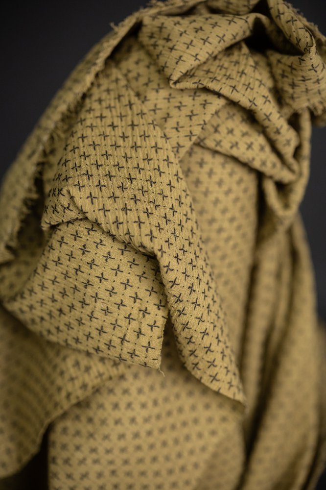 green cross stitch fabric