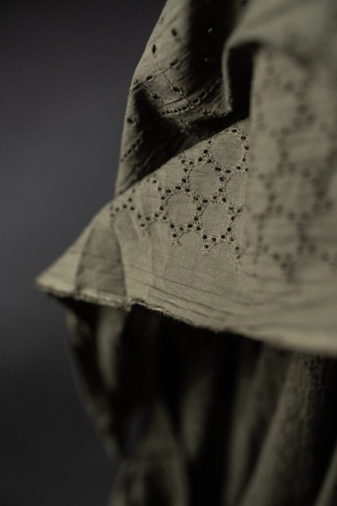 green eyelet embroidered cotton fabric