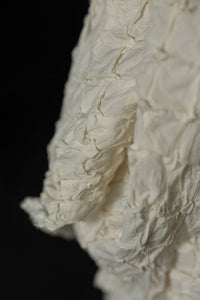 ecru hand smocked fabric