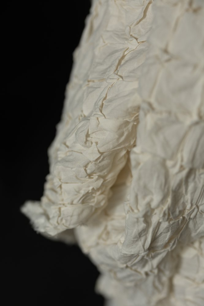 ecru hand smocked fabric