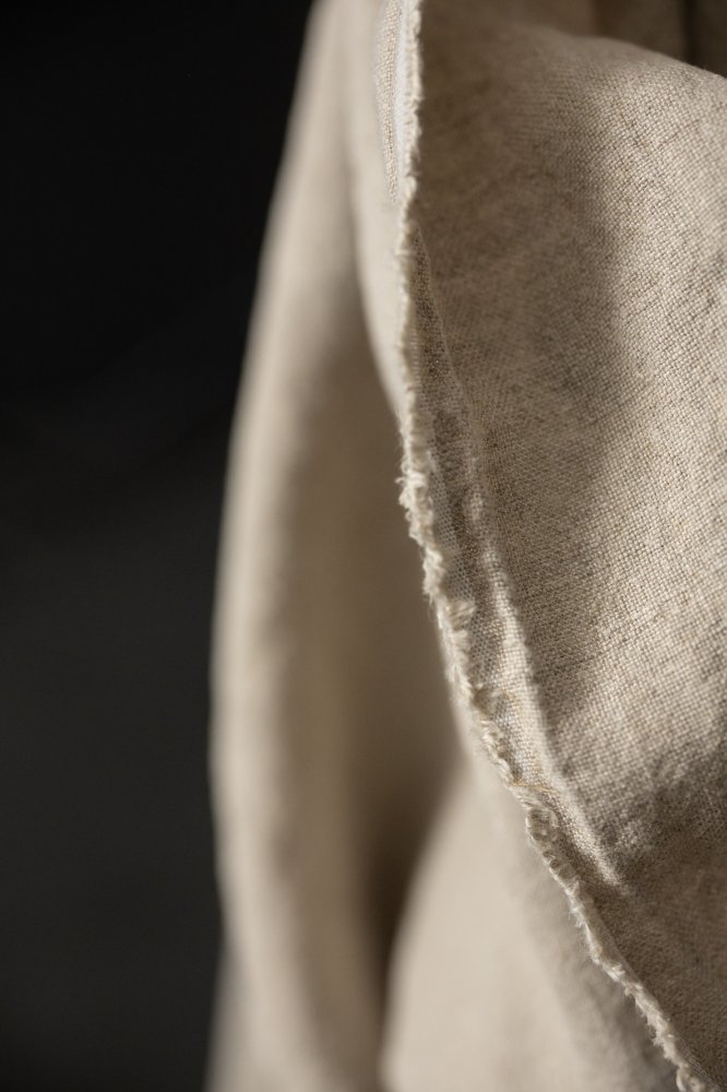 Natural slubby textured stonewashed linen fabric