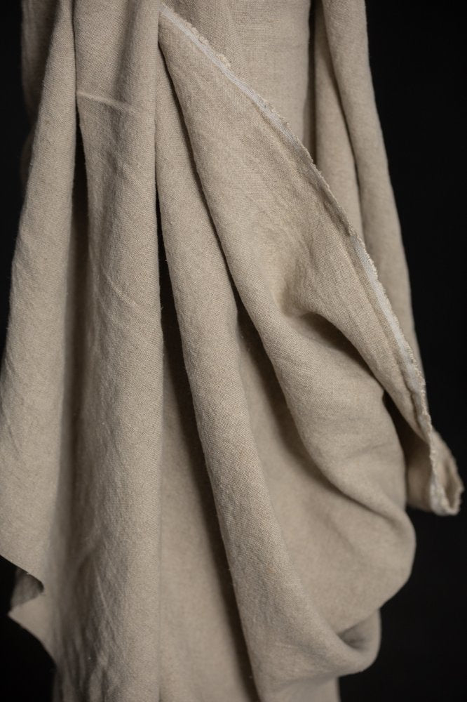 Natural slubby textured stonewashed linen fabric