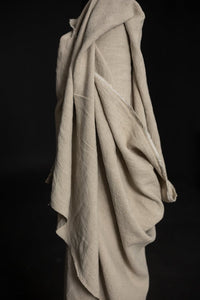 Natural slubby textured stonewashed linen fabric