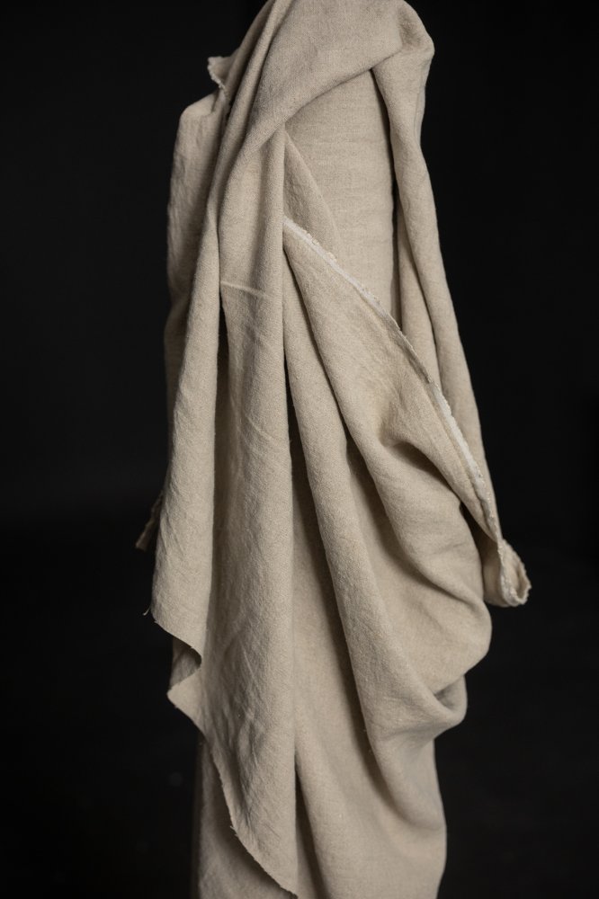 Natural slubby textured stonewashed linen fabric