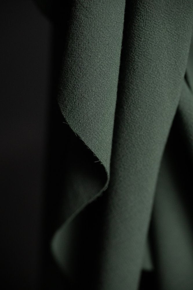green double wool crepe fabric