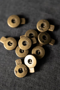 Old Brass Cord Lock