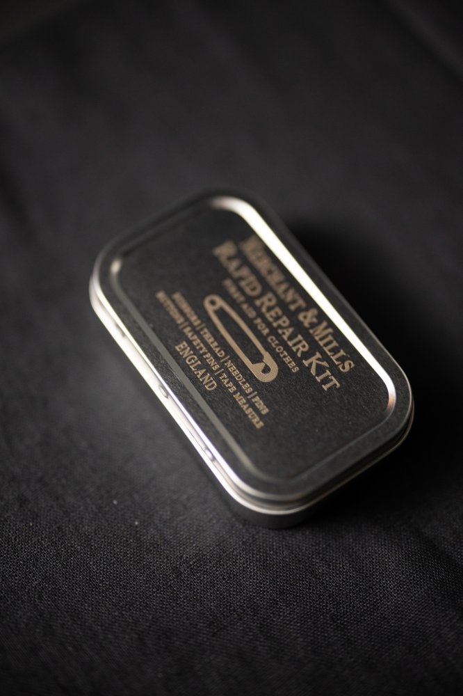 sewing kit in metal tin