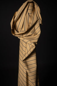 a warm tan ticking stripe fabric