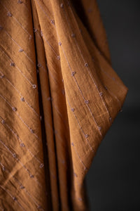 rusty orange loopy indian fabric 