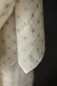 ecru fabric navy crosshatch