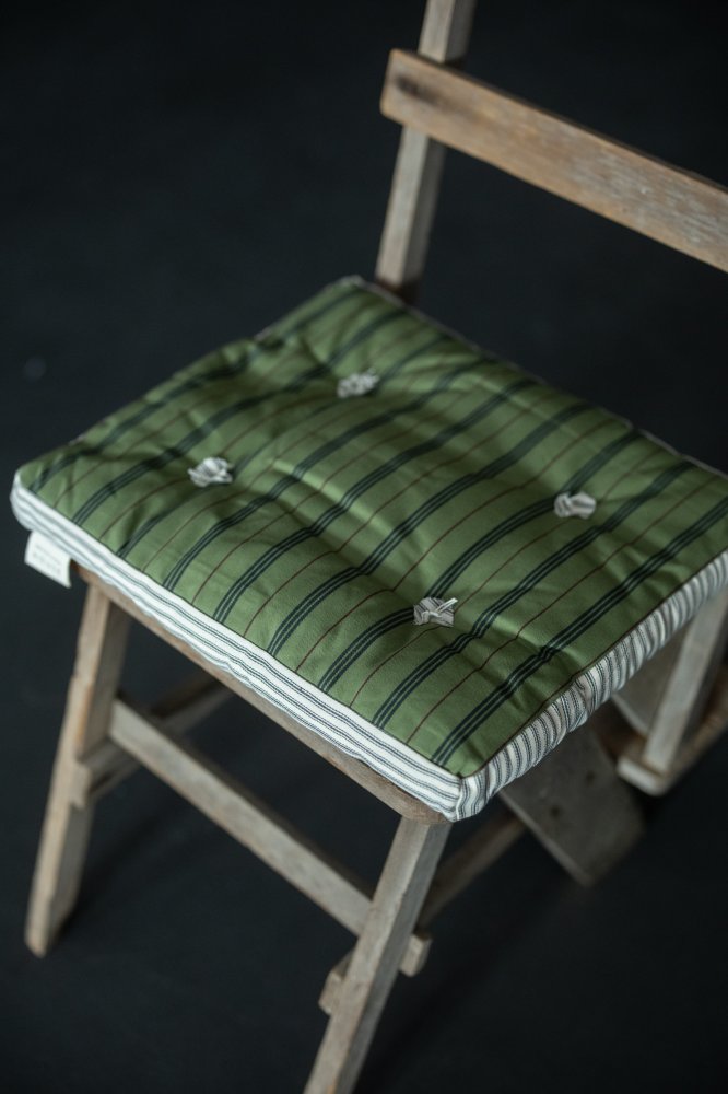 green ticking squab cushions