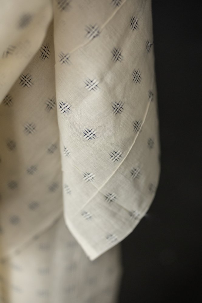 ecru fabric navy crosshatch