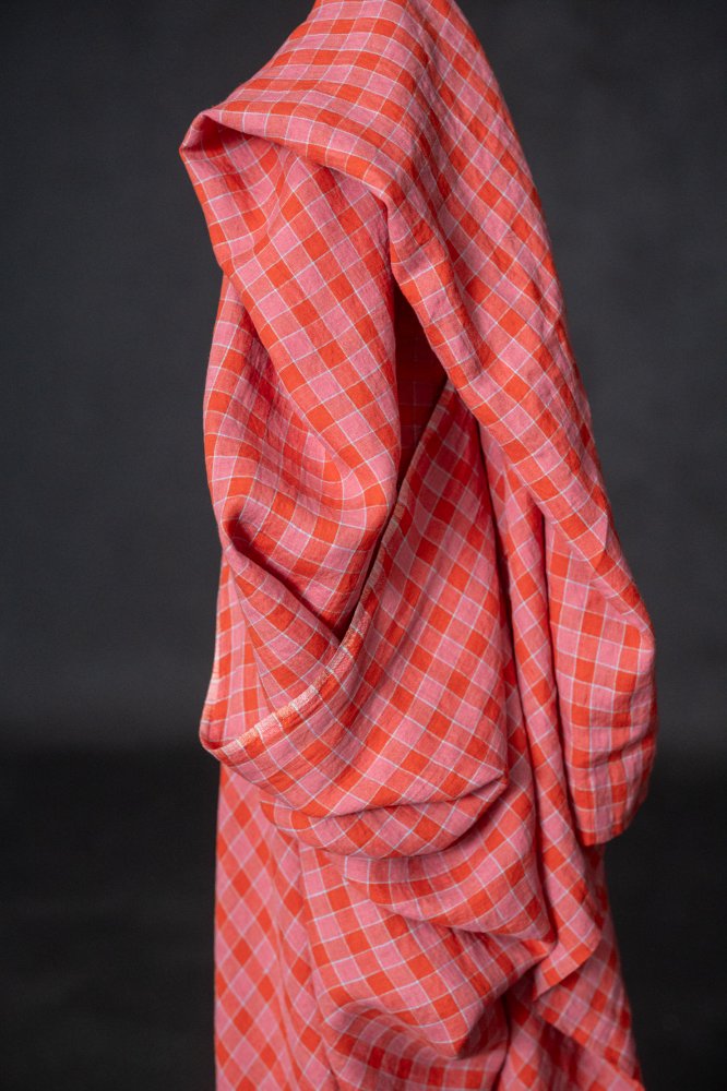 Raspberry pink and coral red with a hint of sky blue linen check fabric