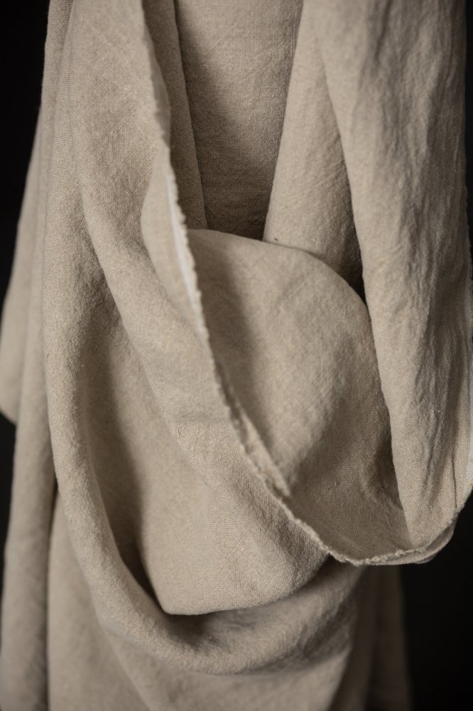 Natural slubby textured stonewashed linen fabric