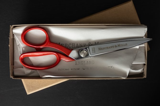 left handed red fabric scissors